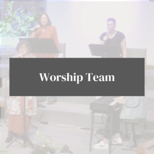 Rectangle with the words Worship Team